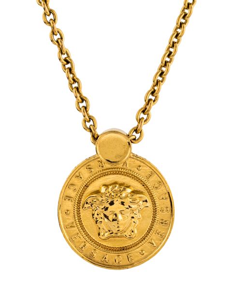 versace medallion|Versace medusa necklace with tag.